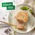Подача корма на тарелке с золотистой ложкой, выделен текст 'Grain Free'. Показывает порцию без зерна.