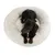 Petit chien noir allongé dans un panier rond en tissu peluche blanc, vu de dessus. Aucun texte ou marque visible.