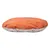 Coussin rond pour animal, dessus en tissu orange uni, dessous à motifs colorés avec dessins de chiens et lignes rouges. Matière textile visible.