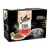 Sheba Fine Flakes in Jelly Succulent Selection, 12x85g. Okusi: govedina, piščanec, jagnjetina, puran. Z naravnimi sestavinami. Embalaža prikazuje sivo mačko in krožnik s hrano.