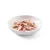 Morceaux de viande rose et blanche dans une assiette blanche, présentés nature sans emballage ni marque visible.
