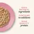 100% natural ingredients, contains no additives, high quality protein – tekst w języku angielskim widoczny obok porcji mokrej karmy na różowym talerzu