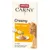 Animonda Carny Creamy cu pui și taurină, 6 x 15g. Imagine cu o pisică lângă o farfurie cu cremă din tub.