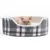 Tiaki cat bed with grey and brown check pattern, soft inner padding made of white plush. Beige cat lying in the bed.