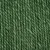 Gros plan sur des fibres torsadées vertes, aspect corde ou sisal, matériau visible utilisé pour accessoires ou griffoirs pour animaux.