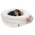 Dog in a white, plush pet bed with pink paw motif and TIA logo.