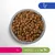 Bowl of dry kibble. Icons show chicken, 1+ years, over 10kg, and silhouettes of three dog sizes. No visible brand or product name.