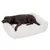 Dog lying on a white, padded pet bed with a soft surface.