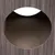 Close-up of a round entrance with brown wood look and an interior made of corrugated cardboard.