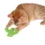 Red cat playing with green cactus-shaped toy made of braided material.
