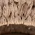 Gros plan sur un tressage de fibres naturelles, matériau visible utilisé pour la fabrication d’accessoires ou paniers pour animaux.