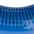 Close-up of blue plastic studs on a surface, possibly part of a massage or grooming product.