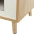 Close-up view of a piece of furniture with wood look, white side panels and round wooden legs.