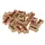 Friandises en forme d’os bicolores, extérieur beige et centre coloré (rouge, vert, marron), empilées en vrac. Aucun emballage ou marque visible.