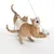 Two cats playing with a fishing rod toy with a white fabric ball and ribbons.