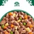 Close-up of wet food with meat pieces, peas, carrots and potatoes in sauce. At the top, a logo with tree, dog and cat.