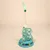 Jouet pour chat en forme de sapin avec balles colorées, étoile blanche au sommet et plume verte suspendue sur une tige métallique. Structure en plastique bleu clair.