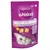 Whiskas Relax & Unwind treats with chicken, 45g pack. Contains relaxing amino acids for calmness. Image shows treat pieces and a cat under a blanket.