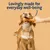 Dog holding an orange chew toy in its mouth, with text above reading 'Lovingly made for everyday well-being'.