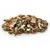 Mixture of pellets, dried vegetables and herbs. Visible are red pepper pieces, white cabbage leaves, sunflower seeds and dried grasses.