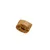Close-up of a brown, porous treat piece with visible filling.