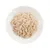 Piatto bianco con carne sfilacciata chiara, presentata senza confezione o altri elementi identificativi visibili.
