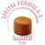 Крокети с надпис 'Special Formula X', диаметър 1 см, видима скала.