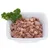 Bowl with wet food, consisting of meat pieces and cubes, garnished with parsley.