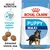 Royal Canin Puppy Maxi -koiranruokapakkaus, tekstit: Health Nutrition, Immune system support, Adapted kibble size. Kuvassa nappuloita ja pentukoira. Royal Canin Puppy Maxi -koiranruokapakkaus, tekstit: Health Nutrition, Immune system support, Adapted kibble size. Kuvassa nappuloita ja pentukoira.