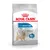 Royal Canin Light Weight Care Mini hondenvoer, tekst: Helps Limit Weight Gain, Proven Results 88% achieved a healthier weight, afbeelding kleine hond op verpakking.