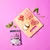 Image showing meat cuts, peas, sweet potato, mint leaves, a capsule and a sachet of Pooch & Mutt Calm & Relaxed food, highlighting visible ingredients in the product.