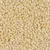 Nahaufnahme von kleinen, beige-farbenen Würfeln aus einem festen Material. Produktdetails nicht sichtbar.