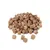 Freeze-dried meat cubes, brown, in various sizes, loosely arranged.