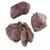 Nahaufnahme von drei Stück gefriergetrocknetem Fleisch, braune Farbe und unregelmässige Form.