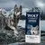 Hund bredvid förpackning med texten 'Wolf of Wilderness Freeze-Dried Raw-Coated Raw Taste Scandinavian Fjords 100% grain-free & potato free recipe'.