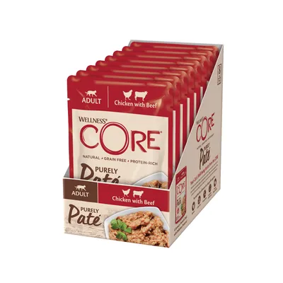 Box of Wellness CORE Purely Paté adult food pouches, chicken with beef flavour, natural, grain free, protein-rich. Eight pouches visible in open display box.