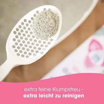 Extra feine Klumpstreu, extra leicht zu reinigen. Abgebildet ist eine weiße Streuschaufel mit Klumpstreu.