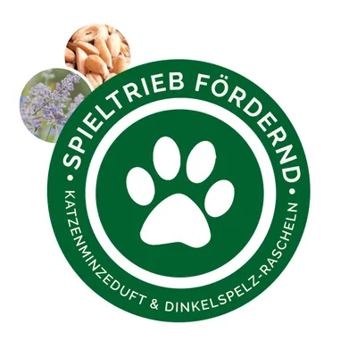 Текст на немски: SPIELTRIEB FÖRDERND, KATZENMINZEDUFT & DINKELSPELZ-RASCHELN. Зелен кръг с лапа, снимки на котешка мента и зърна. Текстът не е преведен на български.