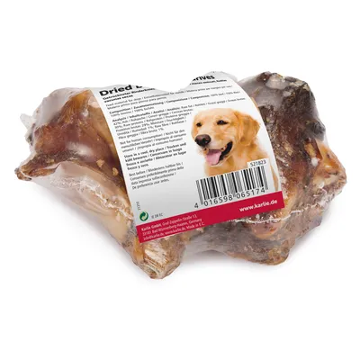 Osso di manzo essiccato senza conservanti, confezione con informazioni sugli ingredienti e codice a barre. Produttore: Karlie GmbH, Made in EU.