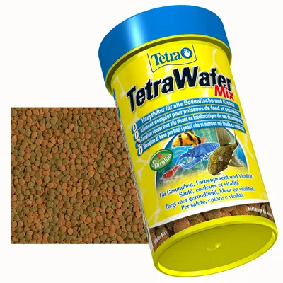 TetraWafer Mix основной корм для донных рыб и раков. Спирулина для здоровья, яркости окраса и жизненной силы. На фото: жёлтая банка и кормовые вафли.