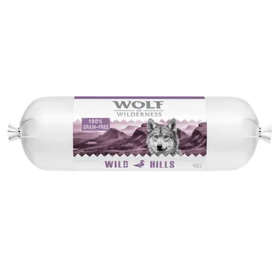 Wolf of Wilderness Wild Hills, 100% kornfri, 400g. Emballage med lilla bjerglandskab og andemotiv.