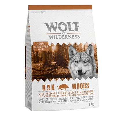 Wolf of Wilderness Oak Woods, 1 kg, ricetta 100% grain-free. Testo visibile: 'lots of fresh chicken meat and wild boar with fruits of the forest, roots and wild herbs'.