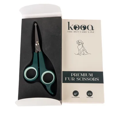 kooa Premium Fur Scissors. Scissors for all coat types, suitable for cutting and shaping. Packaging shows dog sketch and product description.
