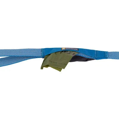 Ruffwear blue fabric lead with mesh detail, showing a green waste bag partially pulled from a built-in pocket. Ruffwear brand name visible on label.