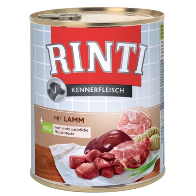 RINTI Kennerfleisch mit Lamm, blik met afbeelding van vleesstukken en tekst: 'NEU noch mehr natürliche Fleischstücke'.