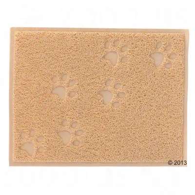 Tapis rectangulaire beige en plastique avec motif empreintes de pattes, surface texturée ajourée. Marquage © 2013 visible dans un coin.