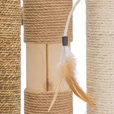 Cat tree elements made of wood and sisal with beige feather pendant. Close-up view of materials.