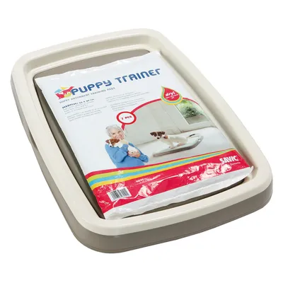 Savic Puppy Trainer, superabsorbierende Trainingspads, Medium 45x30 cm, 7 Stück. Verpackung zeigt Hund auf Trainingspad und Produktdetails.