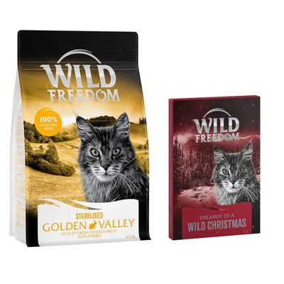 Balení Wild Freedom Sterilised Golden Valley 6,5 kg a krabička Dreamin' of a Wild Christmas, oba s obrázkem kočky a nápisy 100% grain-free recipe, lots of fresh chicken meat with rabbit.