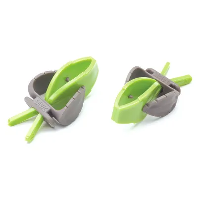 Two green and grey plastic clips with a leaf-shaped design, shown open and closed, for holding objects securely. Brand name 'Savic' visible on each clip.